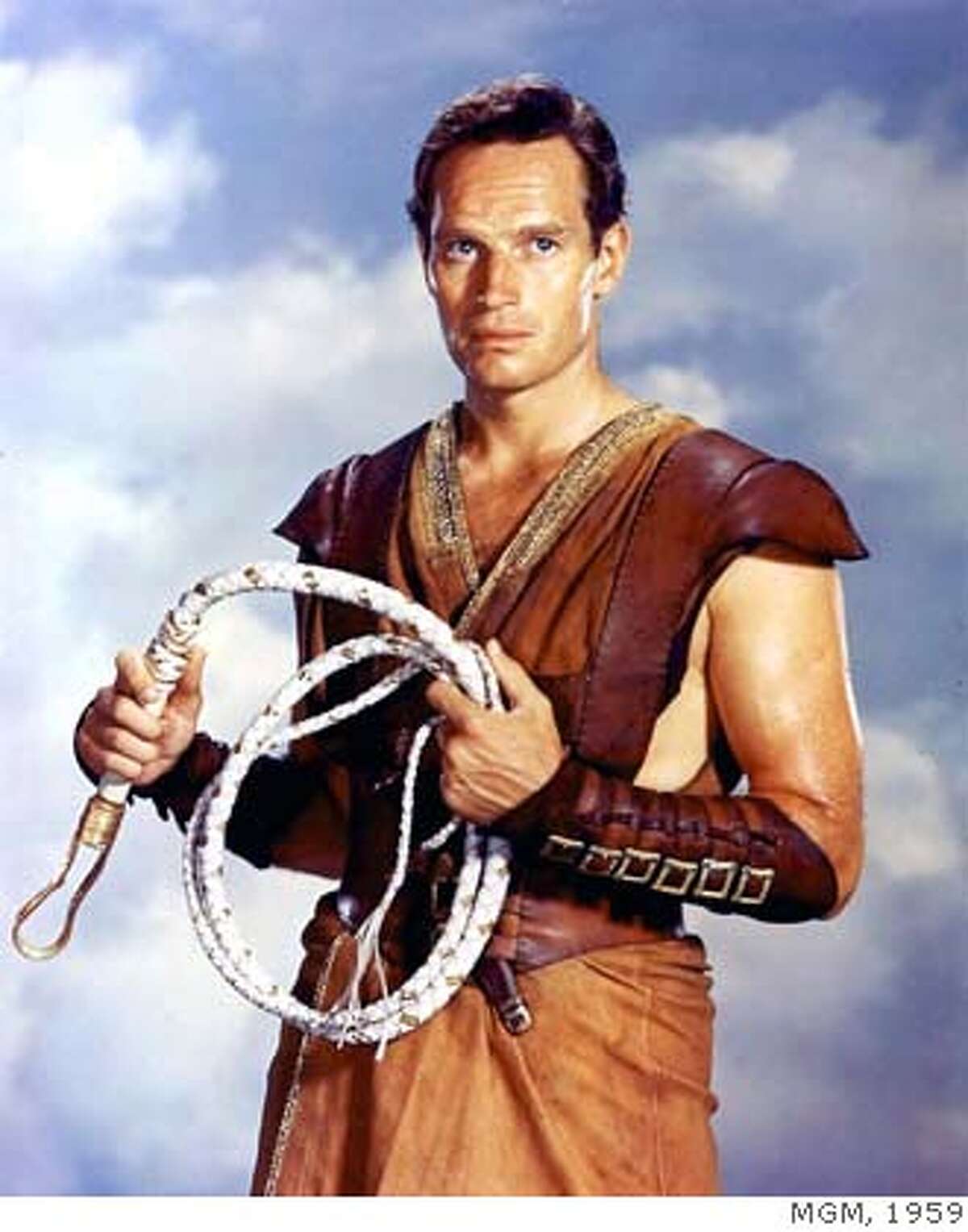 (NYT7) UNDATED -- April 6, 2008 -- OBIT-HESTON-7 -- Charton Heston in the title role in "Ben-Hur." Heston, who appeared in some 100 films in his 60-year acting career but who is remembered chiefly for his monumental, jut-jawed portrayals of Moses, Ben-Hur and Michelangelo, died Saturday night, April 5, 2008, at his home in Beverly Hills, Calif. He was 84, according to his family. (MGM via The New York Times) EDITORIAL USE ONLY - MAGS OUT/NO SALES - FOR USE ONLY WITH STORY SLUGGED: OBIT-HESTON BY ROBERT BERKVIST - ALL OTHER USE PROHIBITED
