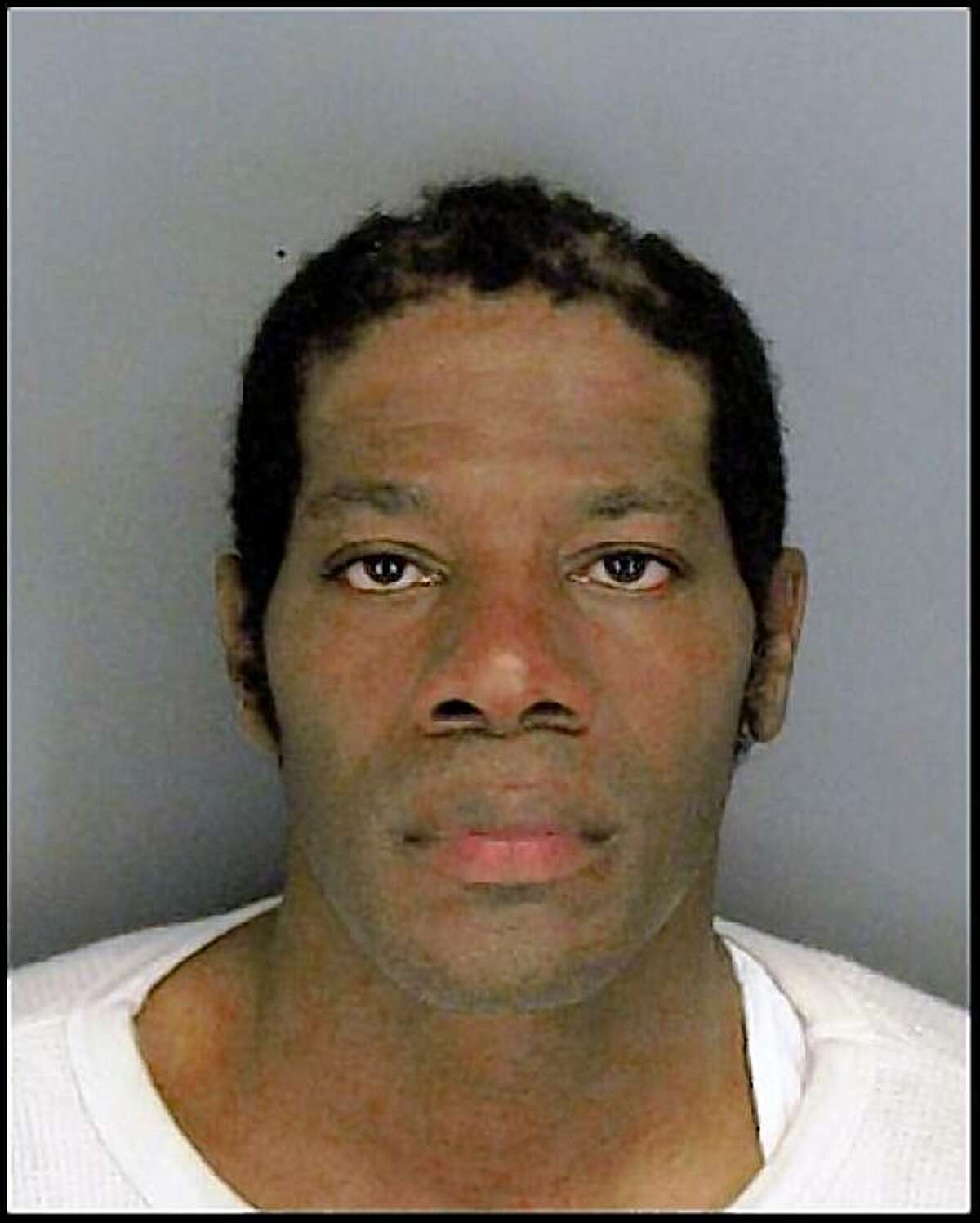This Placer County Jail booking photo shows Nathaniel Burris on Wednesday, August 12, 2009. Burris, accused of killing his ex-girlfriend and her male friend at the Richmond-San Rafael Bridge toll plaza, insisted on pleading guilty during a brief court hearing in Martinez, Calif., on August 14, 2009.