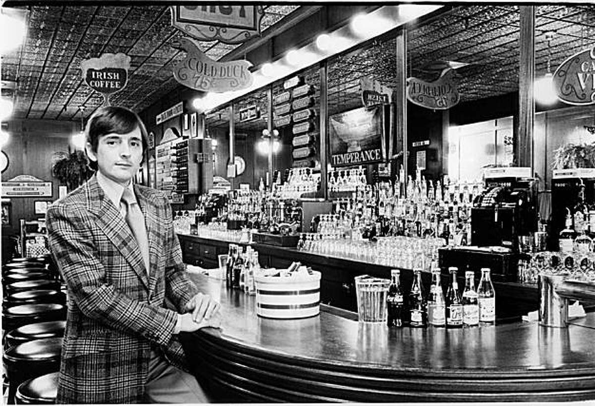 Perry Butler standing at the restaurant's bar.