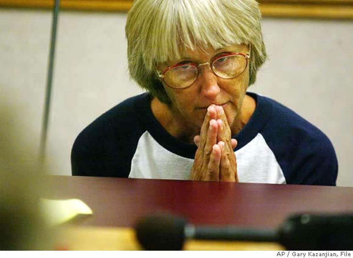 Sara Jane Olson reacts during a one-hour hearing Wednesday, 16,2002 at Central California Women's Facility, In Chowilla, Calif. The state's Board of Prison Terms ruled that the former Symbionese Liberation Army member must serve an additional five or more years in state prison for her role in a 1975 conspiracy to blow up Los Angeles police cars. The three-member board cited the potential for great violence and harm in the crime and Olson's later flight in its decision. (AP Photo/Gary Kazanjian)