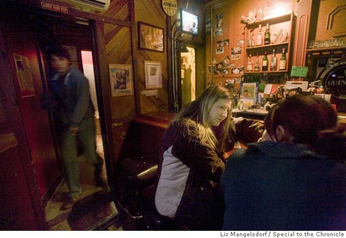 ###Live Caption:Dovre_129.cr2 Brian McElhatton's widow Meghan McElhatton, center, at the bar in the Dover Club on Valencia St. in San Francisco. The owner, Brian McElhatton died a few weeks ago, and we spend some time in the Irish bar. Photo by Liz Mangelsdorf, Special to the Chronicle Event on 2/1/08 in San Francisco.###Caption History:Dovre_129.cr2 Brian McElhatton's widow Meghan McElhatton, center, at the bar in the Dover Club on Valencia St. in San Francisco. The owner, Brian McElhatton died a few weeks ago, and we spend some time in the Irish bar. Photo by Liz Mangelsdorf, Special to the Chronicle Event on 2/1/08 in San Francisco.###Notes:###Special Instructions:MANDATORY CREDIT FOR PHOTOG AND SF CHRONICLE/NO SALES-MAGS OUT