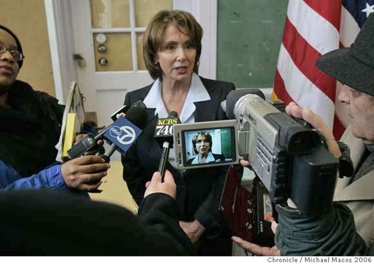 ###Live Caption:Congresswoman Nancy Pelosi's Townhall meeting on Iraq and national security is expected to draw 100's of citizens and some protesters, as well. Marina Middle School in the Marina District. Event in San Francisco, Ca on 1/14/06. Photo by: Michael Macor / San Francisco Chronicle###Caption History:pelosi_244_mac.jpg Pelosi holds a press availablity conference, with the local media following the Town Hall Meeting. Congresswoman Nancy Pelosi's Townhall meeting on Iraq and national security is expected to draw 100's of citizens and some protesters, as well. Marina Middle School in the Marina District. Event in San Francisco, Ca on 1/14/06. Photo by: Michael Macor / San Francisco Chronicle Ran on: 01-17-2006 Rep. Nancy Pelosi met with the media after the town hall.###Notes:###Special Instructions:Mandatory Credit for Photographer and San Francisco Chronicle/ NO Sales- Magazine Out
