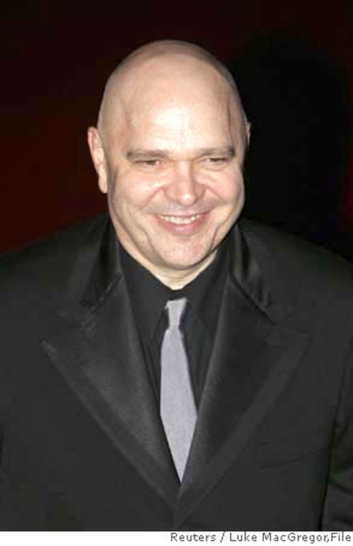 ###Live Caption:Oscar-winning British film director Anthony Minghella arrives for the European premiere of the film 'The Last King of Scotland' on the opening night of the 50th London Film Festival in this October 18, 2006 file photo. Minghella has died aged 54, a spokeswoman for his agent said on March 18, 2008. REUTERS/Luke MacGregor/Files (BRITAIN)###Caption History:Oscar-winning British film director Anthony Minghella arrives for the European premiere of the film 'The Last King of Scotland' on the opening night of the 50th London Film Festival in this October 18, 2006 file photo. Minghella has died aged 54, a spokeswoman for his agent said on March 18, 2008. REUTERS/Luke MacGregor/Files (BRITAIN)###Notes:File photo of Minghella arriving for premiere of "The Last King of Scotland" in London###Special Instructions:0