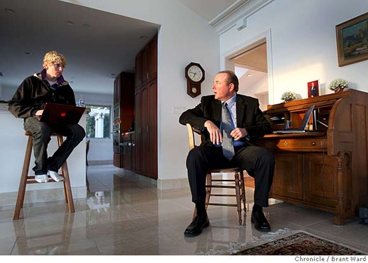 Steve Holetz, right, talks with his son Preston in their Tiburon home about the new online service which would allow family members to access email and online accounts in the event of Steve Holetz death. Photo by Brant Ward / San Francisco Chronicle Ran on: 03-14-2008 Steve Holetz talks with son Preston in their Tiburon home about the online service that could provide information after Holetzs death. Ran on: 03-14-2008 Steve Holetz talks with son Preston in their Tiburon home about the online service that could provide information after Holetzs death.