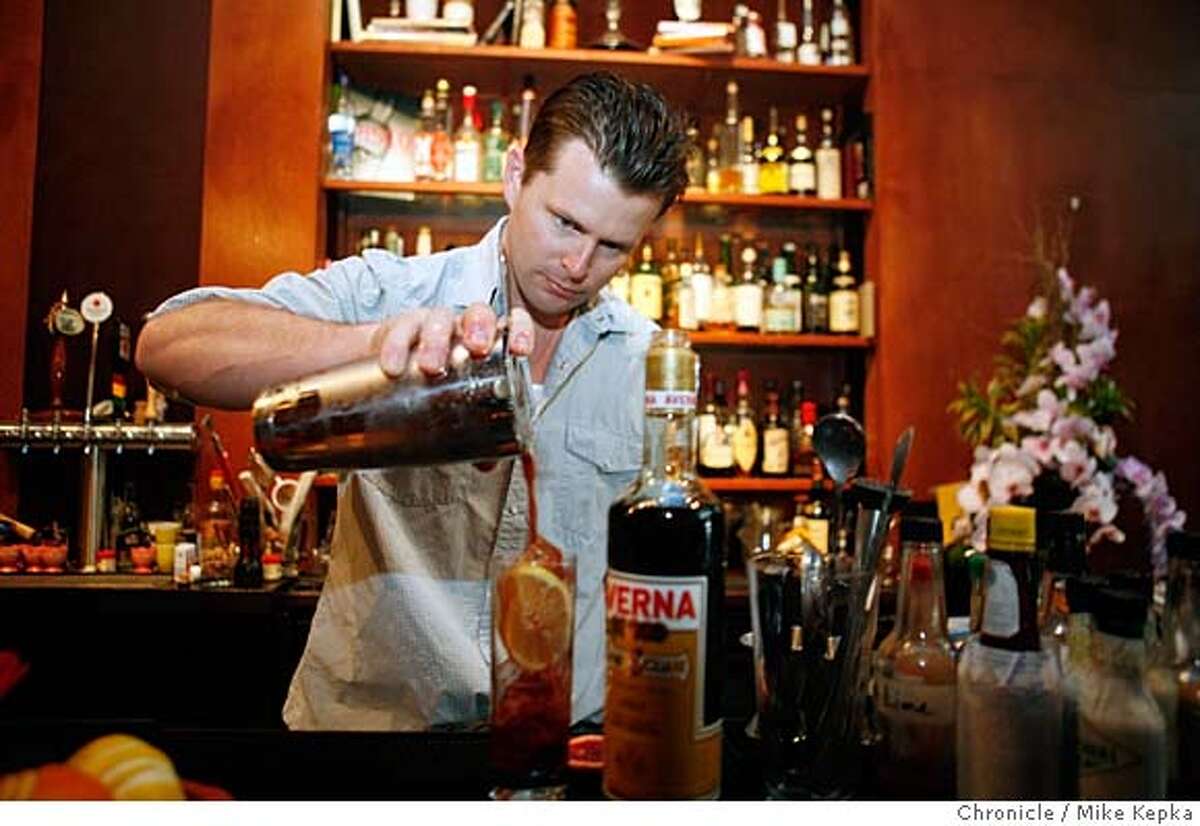 Duggan Mc Donnell, proprietor of the Cantina, makes a Midnight Smash with Averna amaro, cointreau, blackberries, meyer lemons and ginger beer, on Saturday, Feb. 23, 2008 in San Francisco, Calif. Photo by Mike Kepka / San Francisco Chronicle MANDATORY CREDIT FOR PHOTOG AND SAN FRANCISCO CHRONICLE/NO SALES-MAGS OUT