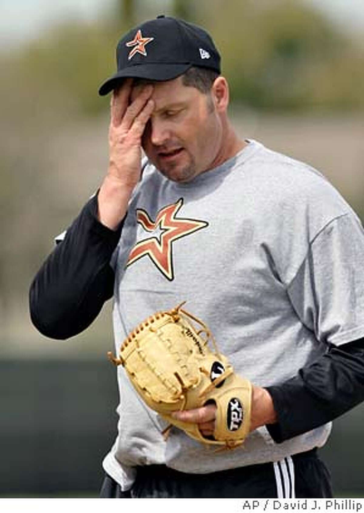 Roger Clemens throws batting practice to the Astros, is not in the