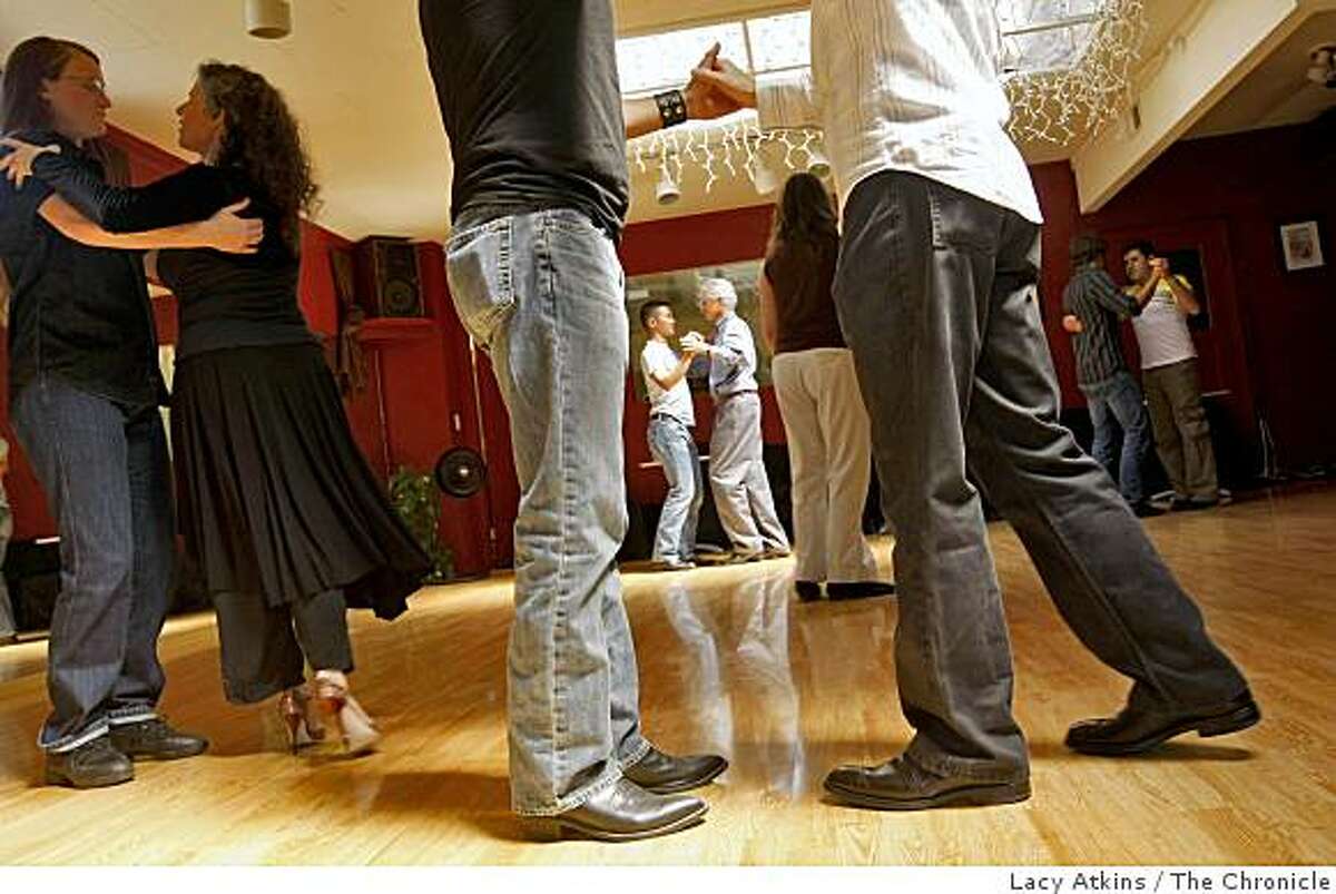 People take a beginner lesson in Tango at the La Pisto dance studio, Sunday June 14, 2009, in preparation for the international Queer Tango Festival on July 1, in San Francisco, Calif.