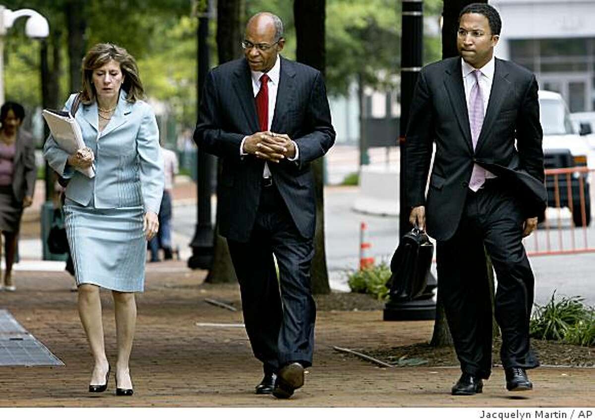 Former Democratic Louisiana Congressman William Jefferson, center, returns to U.S. District Court with members of his defense team, in Alexandria, Va. on Tuesday, June 16, 2009. Jefferson is facing multiple charges including bribery. (AP Photo/Jacquelyn Martin)