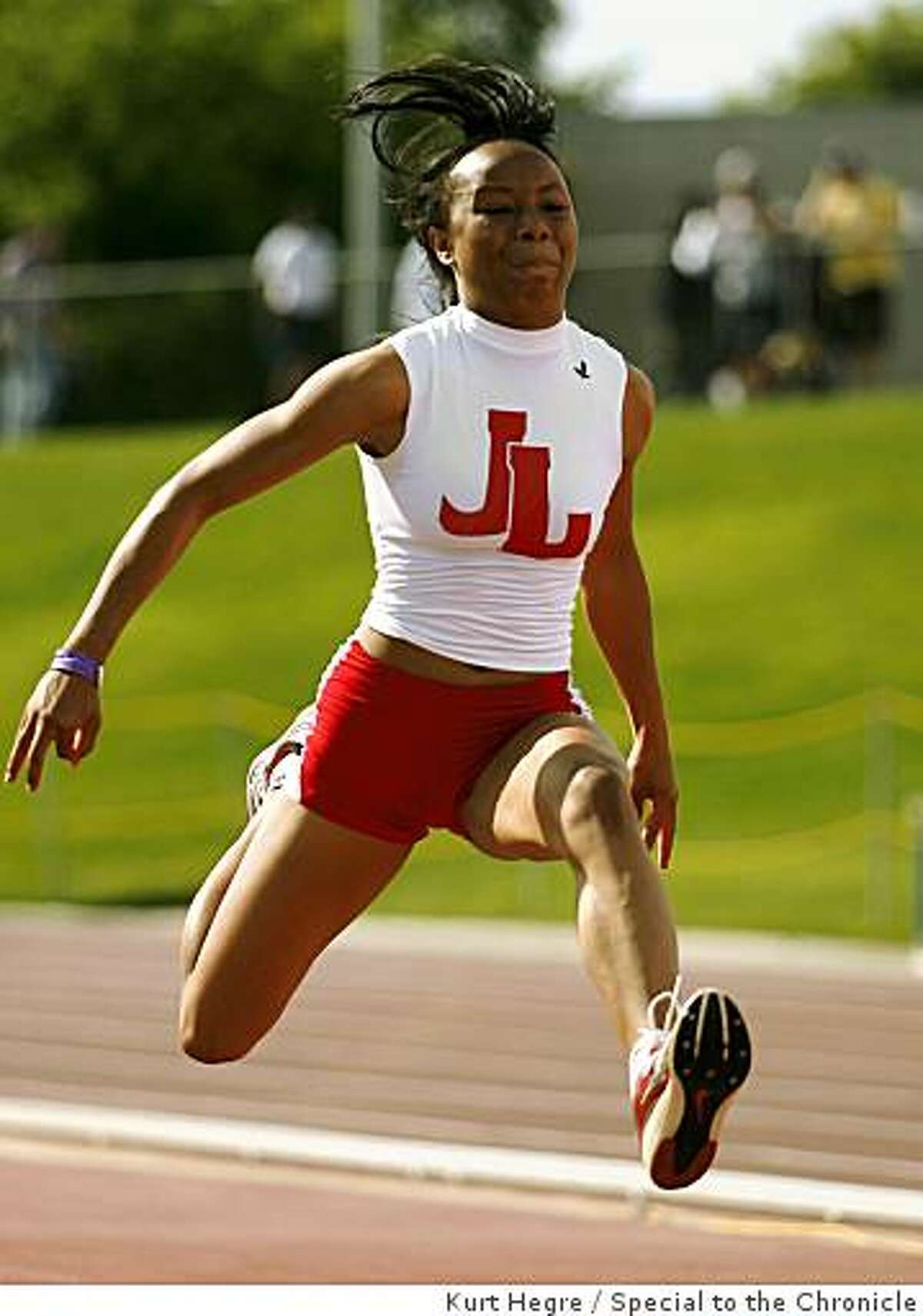 Ciarra Brewer of Logan leaps to first place in the triple jump during the finals of the California State Track and Field Championships in Clovis, Ca Saturday May 6,2009.