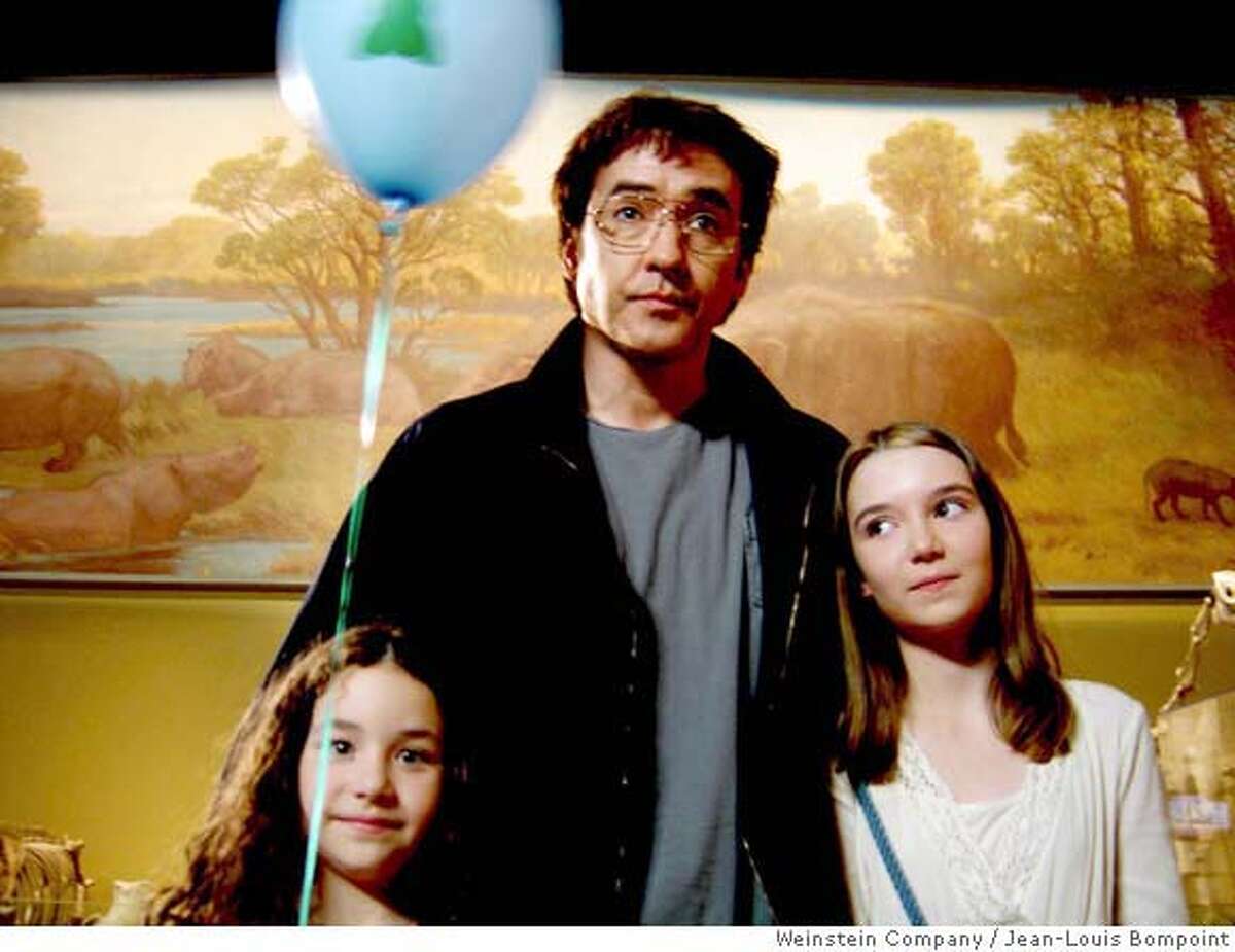In this photo provided by cinematographer Jean-Louis Bompoint, actor John Cusack, in the role of Stanley, tours Chicago's Field Museum, with daughters Dawn, portrayed by Gracie Boednarcyzk, and Heidi, played by Shelan O'Keefe, in a scene from the independent film "Grace is Gone" on April 21, 2006. (AP Photo/Jean-Louis Bompoint, HO) ** NO SALES** Ran on: 06-09-2006 John Cusack with Gracie Boednarcyzk (left) and Shelan OKeefe in Grace Is Gone.