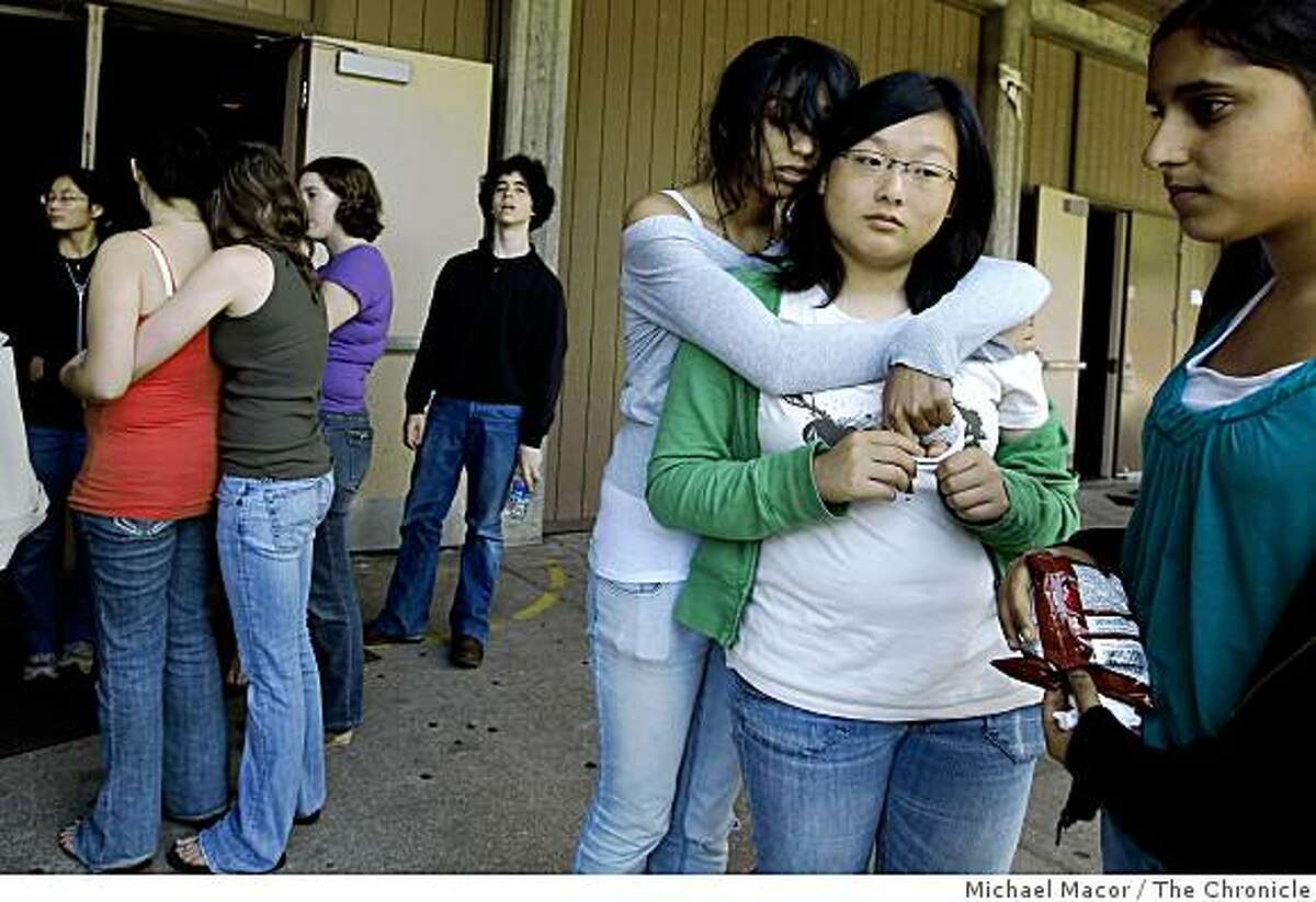 Prachi Mistry and Yvonne Lin, embrace in front of the little theater, on Wednesday June 3, 2009, at Gunn High School in Palo Alto, Calif., where they took drama classes with their friend Sonya Raymakers who was killed by a CalTrain last evening at the East meadow crossing.