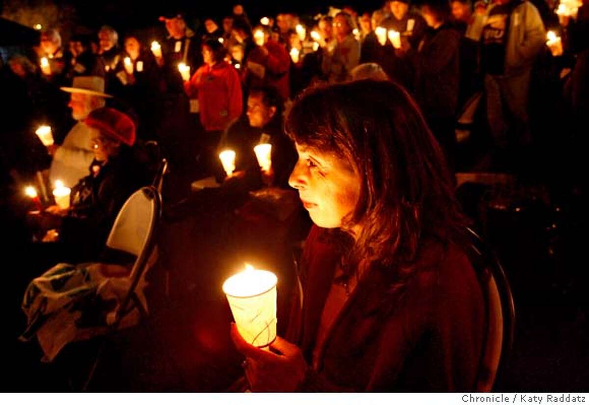 SANTAROSA Lori Serrano, in the foreground, is an RN and a Registered Health Information Technician in Medical Records Codification, participating in this candlelight vigil, who said, "This is much bigger than just me--this is for us all." Lori worked at Santa Rosa Memorial for 5 years as an RN, then fell ill with multiple sclerosis; she got a degree as a Registered Health Information Technician and worked for an additional 23 years. Now her entire department has been outsourced to a company in Colorado. Nuns and priests are on opposite sides of efforts to organize workers at Santa Rosa Memorial Hospital. The Sisters of St. Joseph, who own the hospital, which is part of the St. Joseph Health System, do NOT support unionization; local priests say the nuns are thwarting long-standing Catholic tradition of fair working and organizing principles. These pictures were made on Thursday, Jan. 17, 2008, in Santa Rosa, CA. KATY RADDATZ/The Chronicle MANDATORY CREDIT FOR PHOTOG AND SAN FRANCISCO CHRONICLE/NO SALES-MAGS OUT