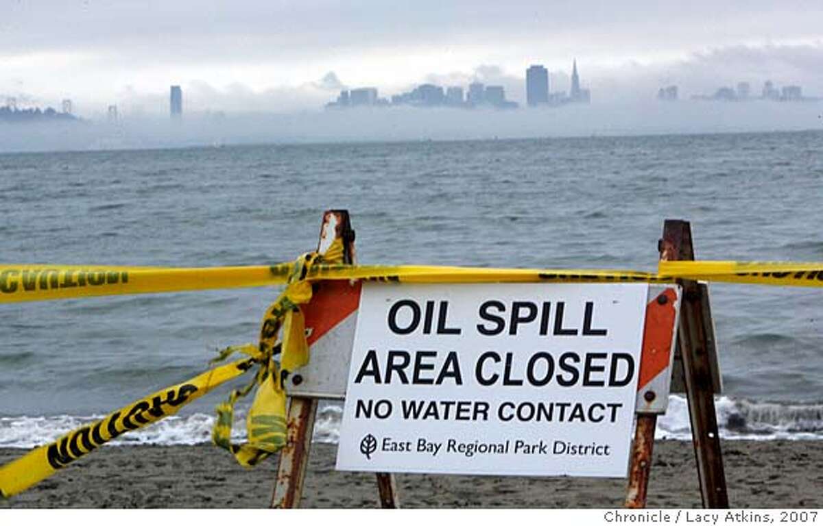 Some of the beaches in the East Bay are still closed due to the oily debris in the water and on the shore, Sunday Nov. 18, 2007, off the Albany Waterfront, in Abany, CA.Photographer: Lacy Atkins /San Francisco Chronicle Photo taken on 11/18/07, in ALBANY, CA, USA Ran on: 11-19-2007 Some East Bay beaches remain closed almost two weeks after the freighter Cosco Busan dumped 58,000 gallons of fuel into the bay. Ran on: 11-19-2007 Some East Bay beaches remain closed almost two weeks after the freighter Cosco Busan dumped 58,000 gallons of fuel into the bay.