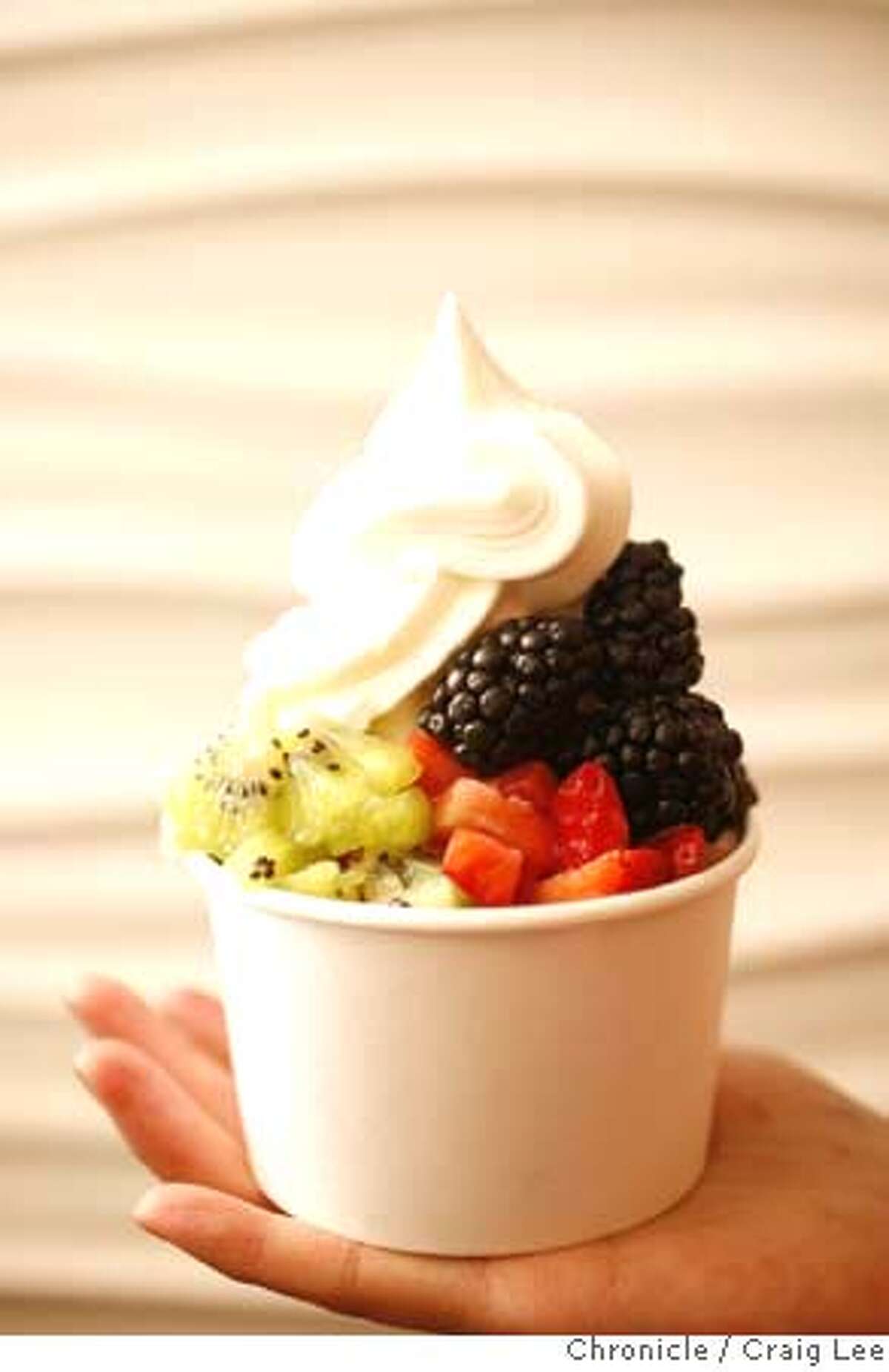 Story about yogurt, a trend story about fresh and frozen and the explosion of brands. This is at a place called Fraiche in Palo Alto, that is making their own yogurt. Photo of frozen fresh natural yogurt topped with kiwi, strawberries and blackberries. on 1/14/08 in Palo Alto. photo by Craig Lee / The Chronicle Ran on: 01-20-2008 MANDATORY CREDIT FOR PHOTOG AND SF CHRONICLE/NO SALES-MAGS OUT