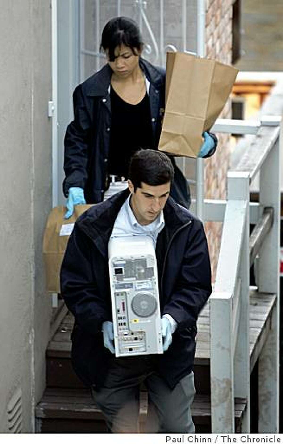 Federal agents removed two desktop computers and several unmarked bags of evidence from Nick Perata's home. FBI and IRS authorities served a search warrant at the home of Nick Perata on 12/15/04 in Oakland, CA. Perata and his father state Senate Leader Don Perata are under federal investigation.
