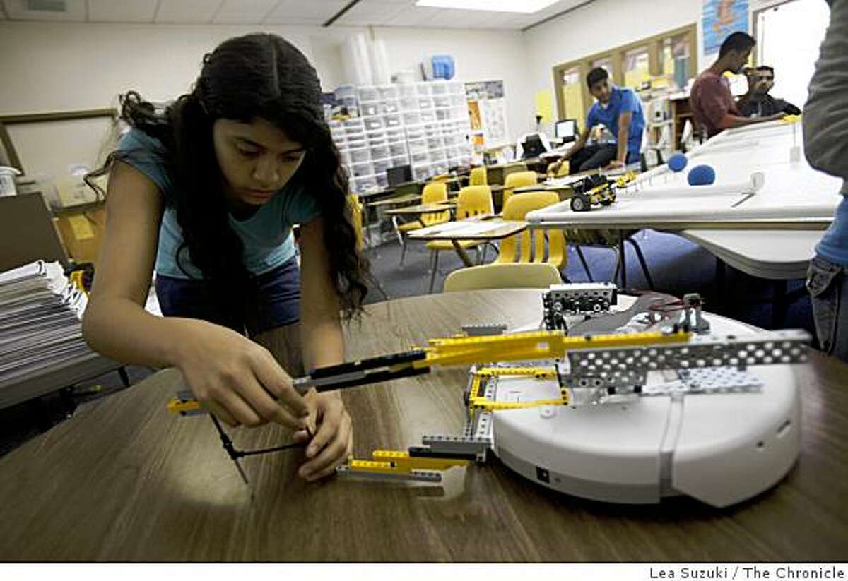 Diana Rodriguez, 16, San Jose Oak Grove High School sophomore and member of the San Jose Oak Grove High School Botball Robotics team works on the Eaglett's team robot at school in San Jose, Calif. on Wednesday May 20, 2009.. Rodriguez is team leader of one of the three teams, the Eagletts. The San Jose Oak Grove High School Botball Robotics team won the regional championships in a robotics contest and has been invited to compete in the International Botball Robotics Competition in Washington DC June 30 - July 7, 2009.