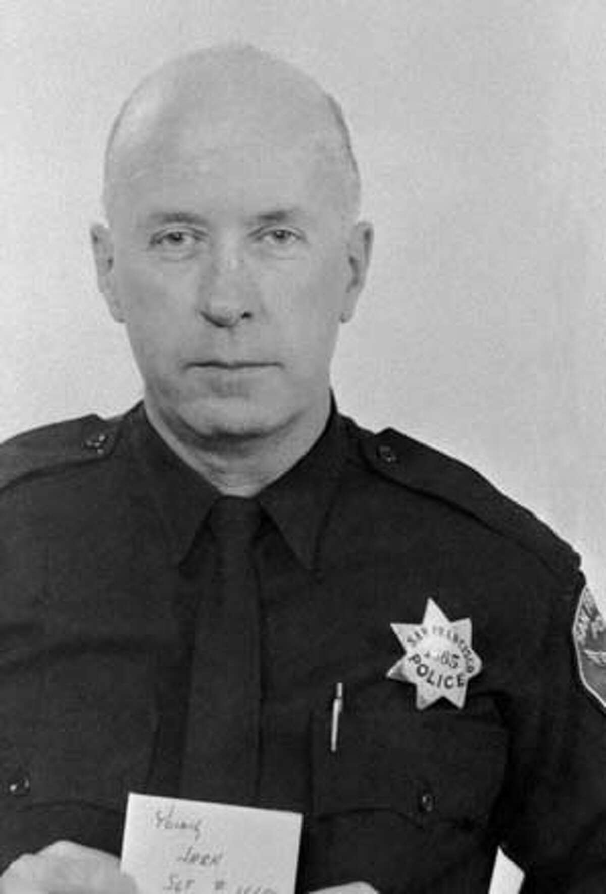 ** UPDATES CAPTION INFORMATION TO EIGHT PEOPLE ARRESTED - FILE ** Sgt. John V. Young is shown in this 1971 San Francisco Police Department photo. Eight people were arrested Tuesday in the 1971 killing of Young, authorities said. Sgt. John V. Young, 51, was killed in an attack on a police station, which also injured a civilian clerk. Police said seven of the eight people arrested are believed to be former members of the Black Liberation Army, a violent offshoot of the Black Panther Party that was active in the Bay Area in the 1970s and early 1980s, authorities said. (AP Photo/San Francisco Police Department) Ran on: 01-24-2007 Francisco Torres (above, center) is escorted by police in New York. He is among eight men charged with Youngs murder; a ninth is charged with conspiracy to murder police officers. Ran on: 01-24-2007 Ran on: 01-24-2007 Francisco Torres (above, center) is escorted by police in New York. He is among eight men charged with Youngs slaying; a ninth is charged with conspiracy to murder police officers. ALSO Ran on: 01-26-2007 Francisco Torres is a suspect because of a fingerprint match. 1971 AP FILE PHOTO.