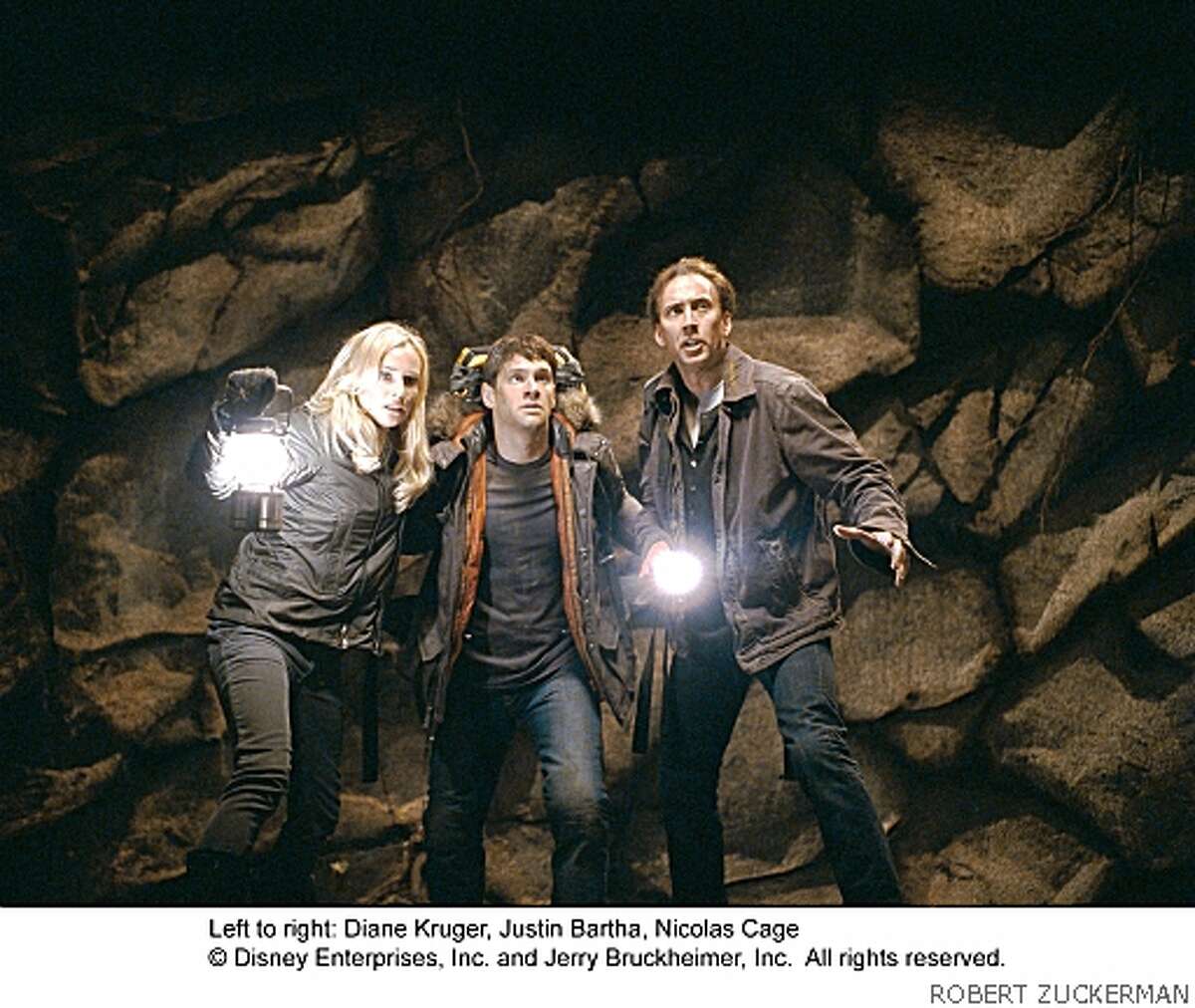 "NATIONAL TREASURE: THE BOOK OF SECRETS"PH:ROBERT ZUCKERMAN© 2007 Buena Vista Pictures and JERRY BRUCKHEIMER, Inc. All rights reserved.Ran on: 12-21-2007Diane Kruger, Justin Bartha and Nicolas Cage in National Treasure: Book of Secrets.Ran on: 12-29-2007Carol Anderson (right) of Piedmont read two reviews of Enchanted before bringing her sons Henry Bendon, 10, (left) and Isaac Bendon, 6, to see it in San Francisco on Christmas Eve. She's part of the parent-driven success of movies with G and PG ratings.