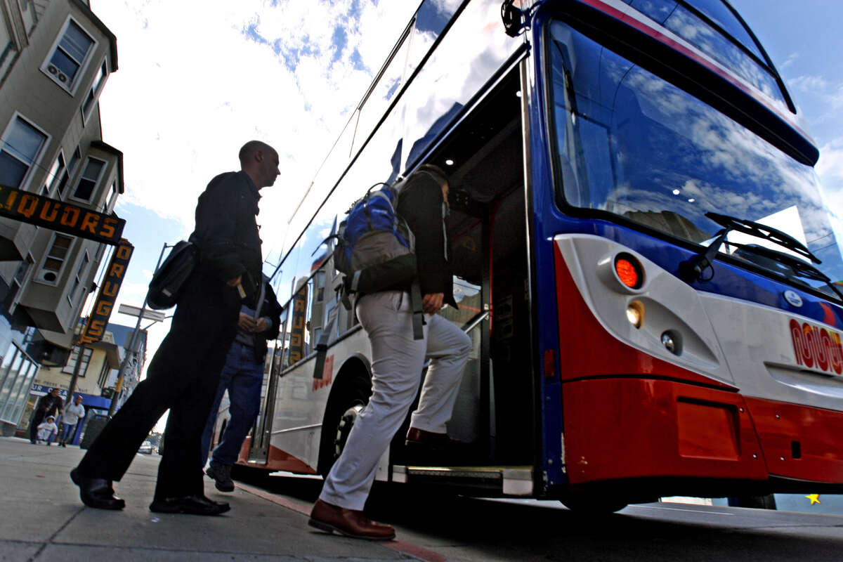 Riders give test of double-decker bus a high five