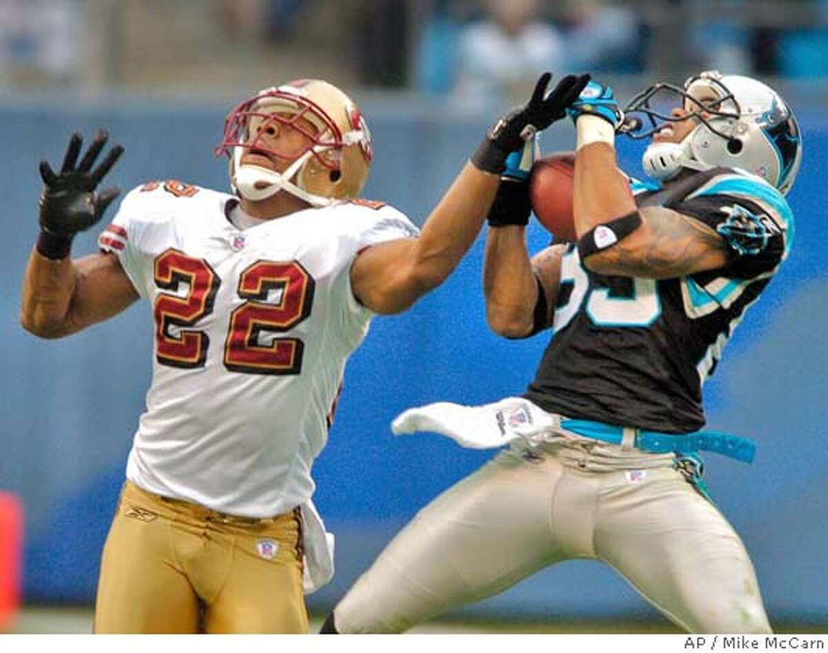 San Francisco 49ers Nate Clements (22) celebrates intercepting a