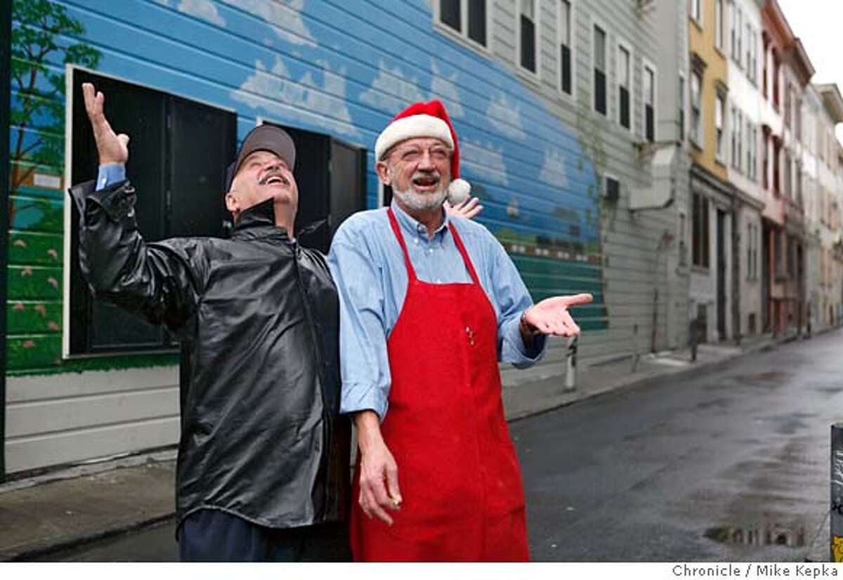 Don russo (left) and Gigi fiorucci are getting a mural painted in Jasper Alley to honor the memory of long time restaurantuer and general north beach character Dante Benedetti. The mural is on the side of the building, formerly owned by Bendetti, that used to be a restaurant/boarding house used largely by new immigrants looking for work in North Beach. Mike Kepka / The Chronicle Photo taken on 12/6/07, in San Francisco, CA, USA MANDATORY CREDIT FOR PHOTOG AND SAN FRANCISCO CHRONICLE/NO SALES-MAGS OUT