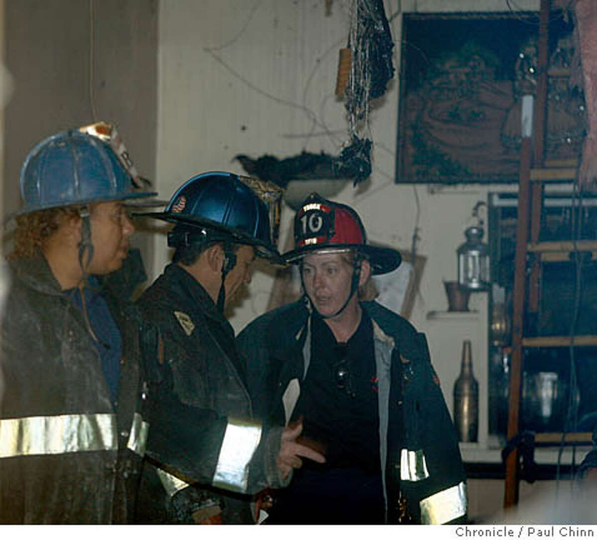 Fire offficials investigate inside the Star of India after two people died in an early morning fire at the restaurant on Polk Street in San Francisco, Calif. on Thursday, Nov. 29, 2007. According to fire department officials, the two people were found in a loft above the restaurant. PAUL CHINN/The Chronicle