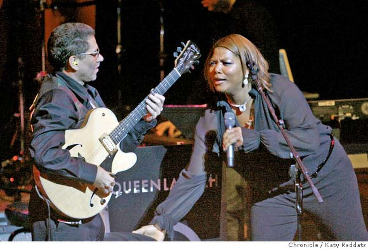 LATIFAH27 L: Mike Feingold solos with Queen Latifah (R). Queen Latifah performs at Davies Symphony Hall on her Trav'lin' Light Tour. These pictures were made on Sunday, Nov. 25, 2007, in San Francisco, CA. KATY RADDATZ/The Chronicle Photo taken on 11/25/07, in San Francisco, CA, USA MANDATORY CREDIT FOR PHOTOG AND SAN FRANCISCO CHRONICLE/NO SALES-MAGS OUT