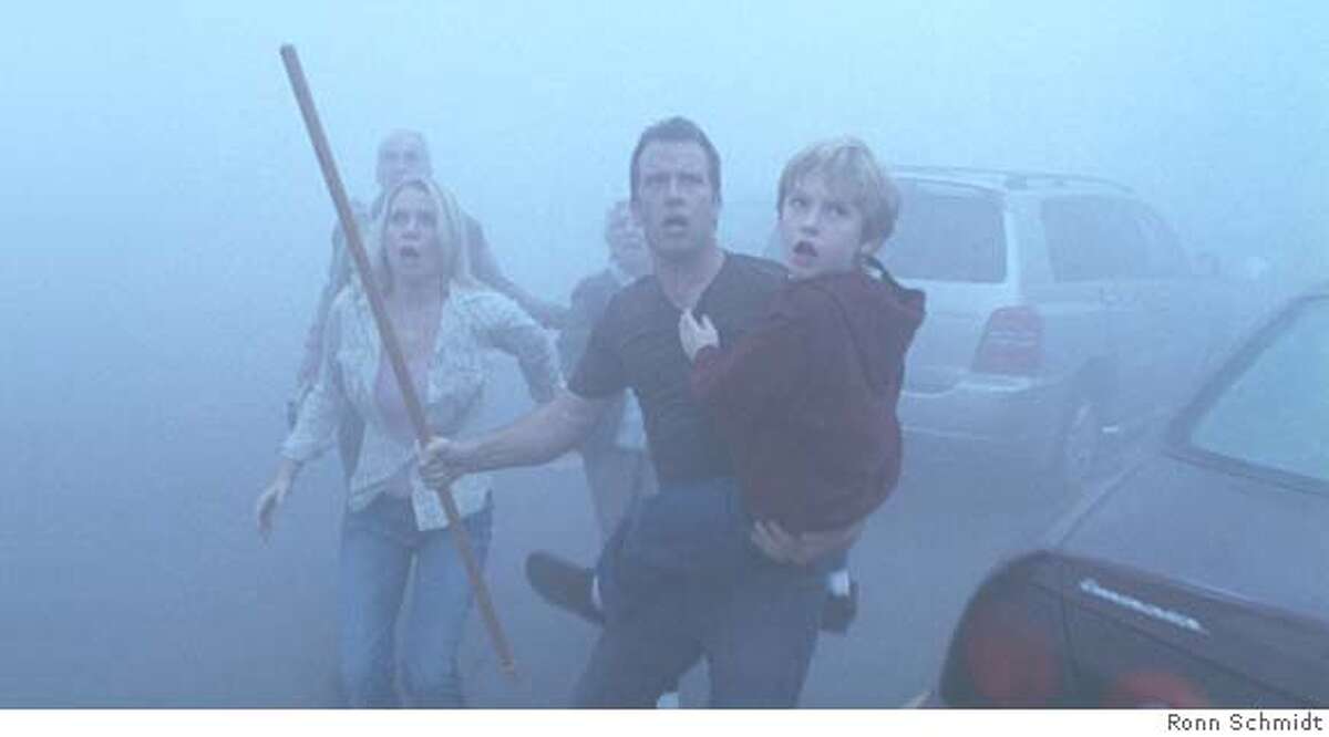 Laurie Holden, Thomas Jane and Nathan Gamble star in Frank Darabont's adaptation of Stephen King's The Mist. Ran on: 11-21-2007 Laurie Holden, Thomas Jane and Nathan Gamble in The Mist.