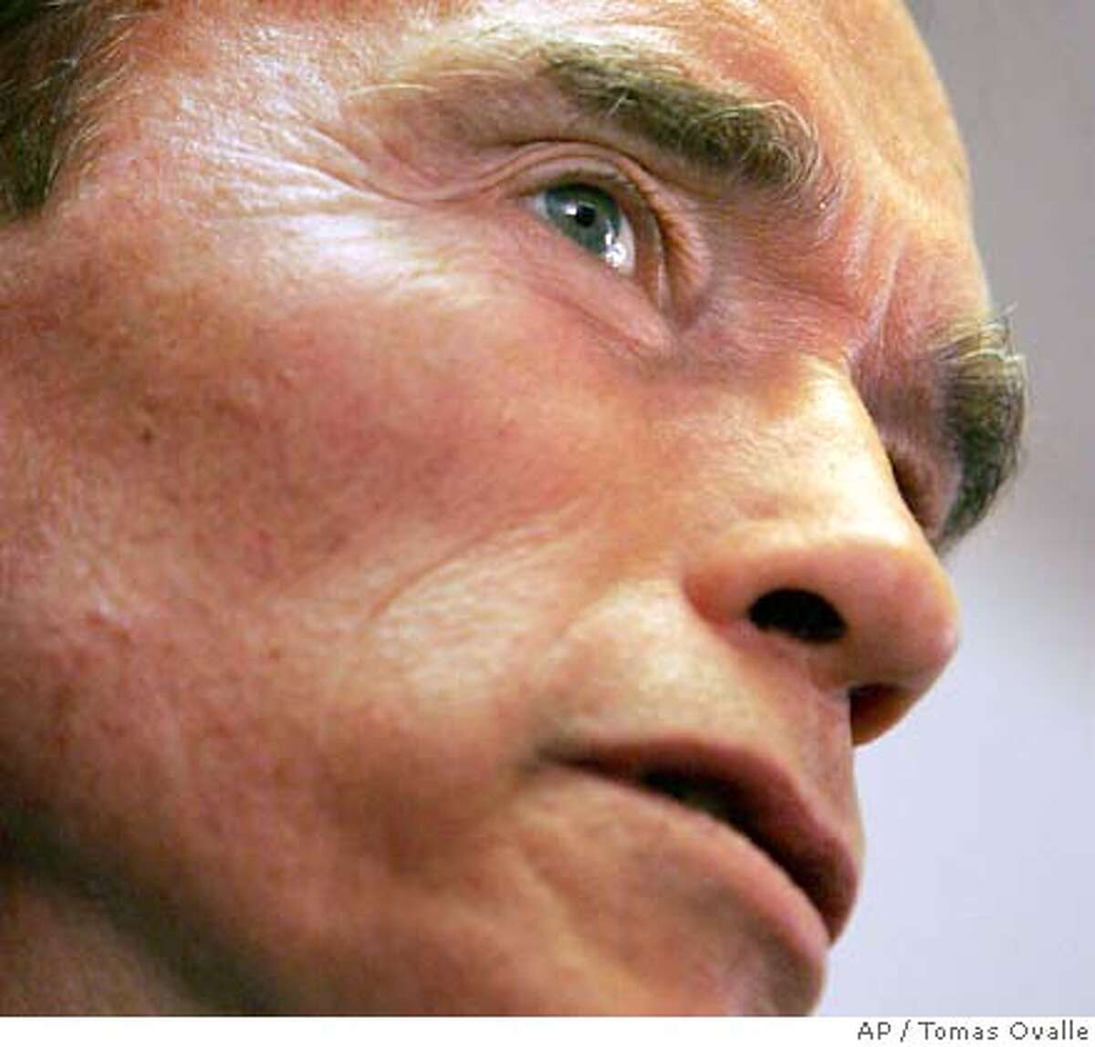 California Gov. Arnold Schwarzenegger addresses the issue of home foreclosures with a visit to Design Financial Solutions Fresno, Calif., on Tuesday, Nov. 20, 2007. The governor came to meet with industry professionals to look for solutions to the epidemic of foreclosures hitting California. (AP Photo/Tomas Ovalle/ The Fresno Bee)