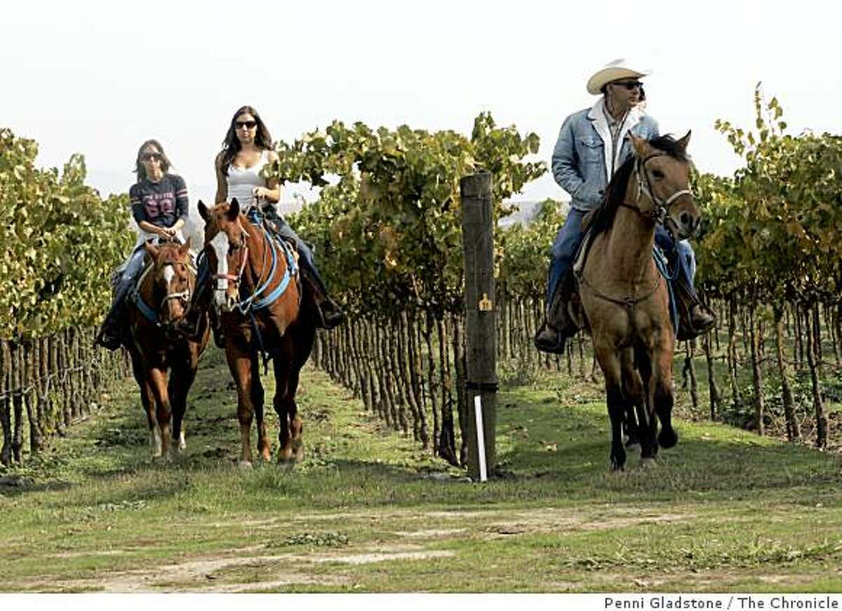 At the Larson Family Winery, Rafael Hernandez in the cowboy hat takes children and adults on horseback or wagon rides through the vineyards. He started the concept in 1999.