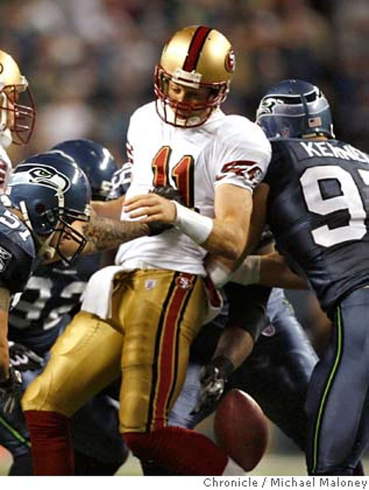 San Francisco 49ers quarterback Alex Smith (11) is sacked and loses the ball in the 1st quarter. Seattle recovered. The Seattle Seahawks host the San Francisco 49ers in a Monday night football game at Qwest Fleld in Seattle. Photo taken on 11/12/07, in Seattle, WA. Photo by Michael Maloney / San Francisco Chronicle ***Code replacement/roster MANDATORY CREDIT FOR PHOTOG AND SF CHRONICLE/NO SALES-MAGS OUT