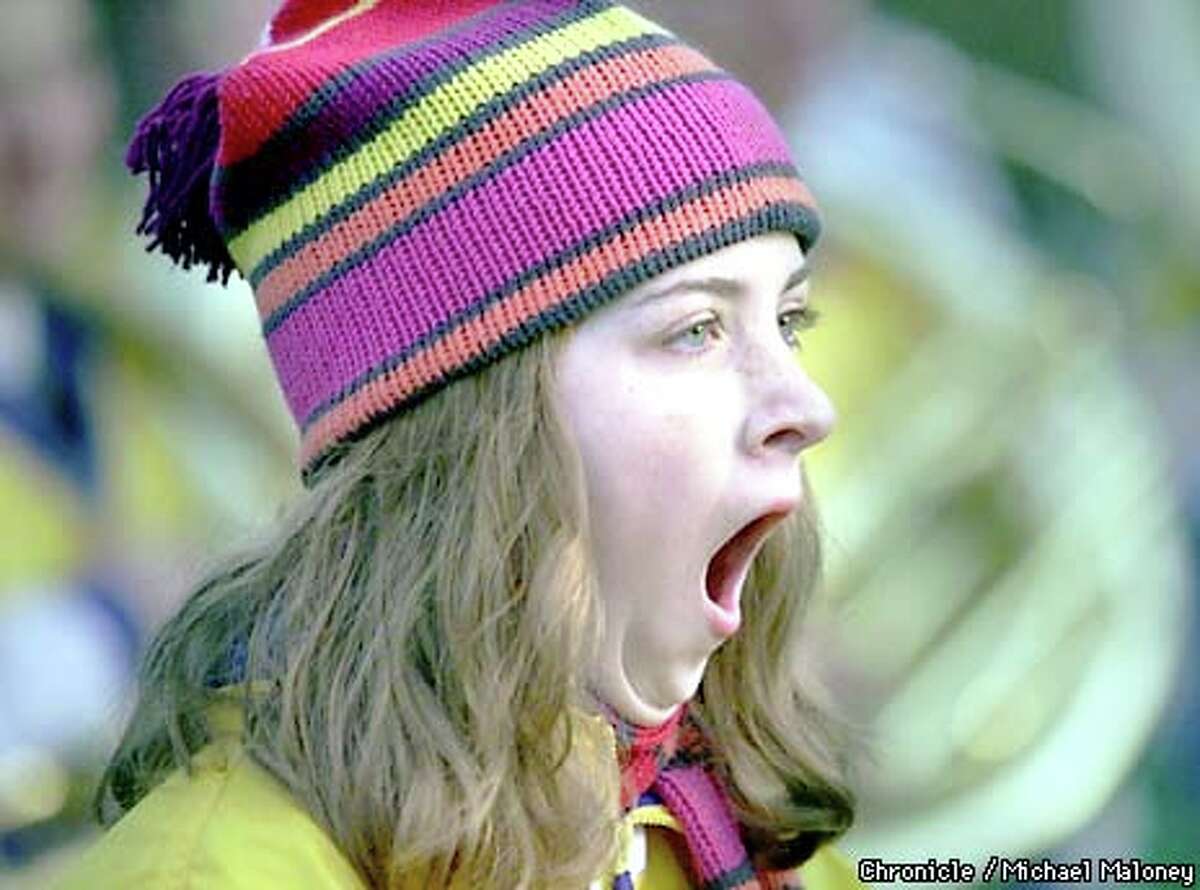 Kerry Winiger, a 10th-grade trumpet player, yawned during a rehearsal timed to acclimate students to their 3:30 a.m. wake-up call on New Year's Day. Chronicle photo by Michael Maloney