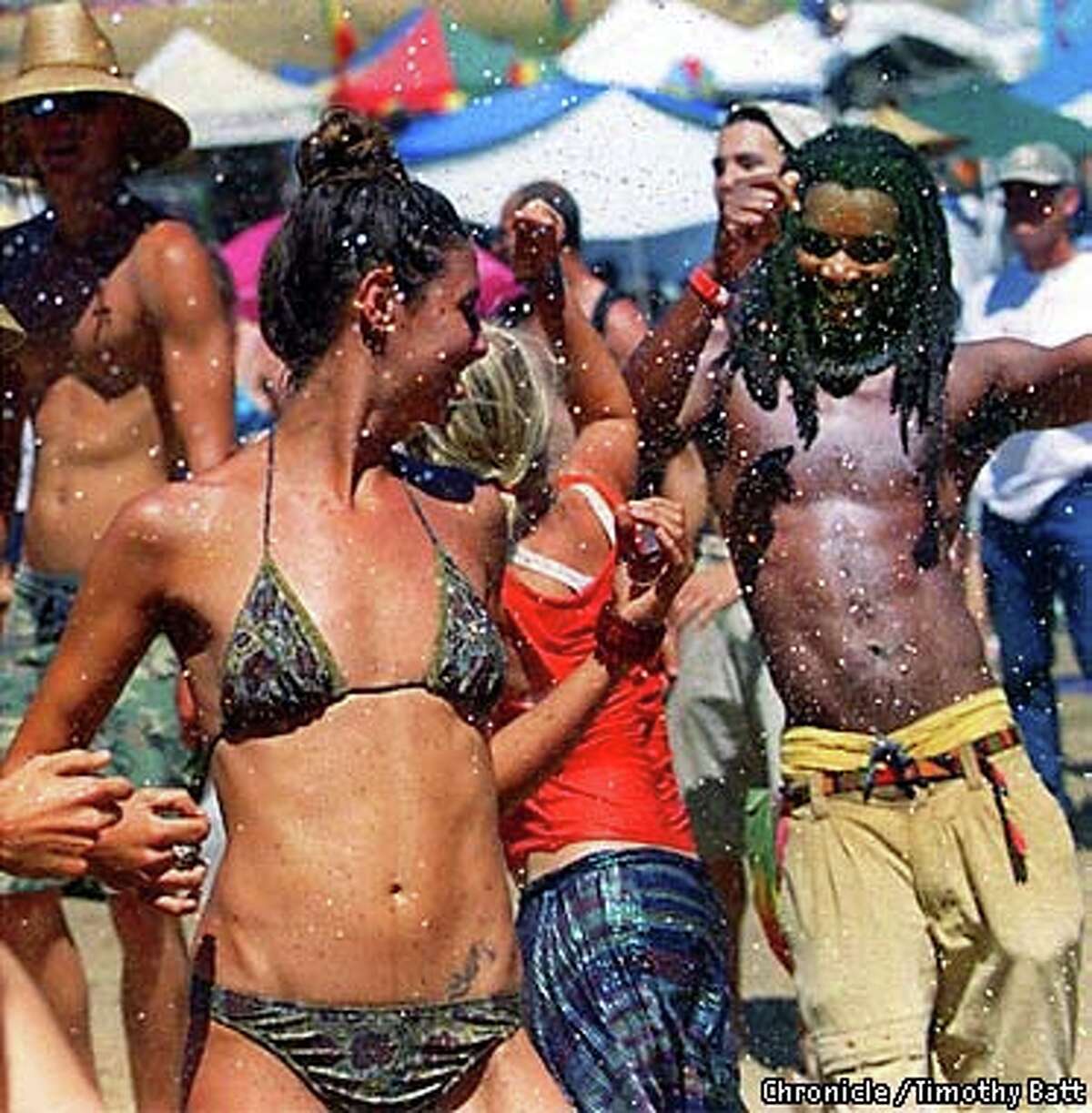 Reggae fans yielded to the beat and the heat at a past Reggae on the River Festival. Chronicle photo by Timothy Batt