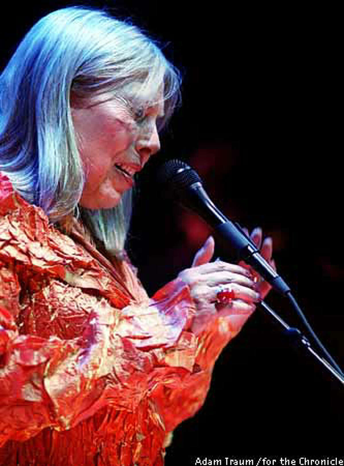Joni Mitchell, backed by a full symphony orchestra, sang from her album of pop standards Saturday night at the Chronicle Pavilion in Concord. Photo by Adam Traum, for the Chronicle.