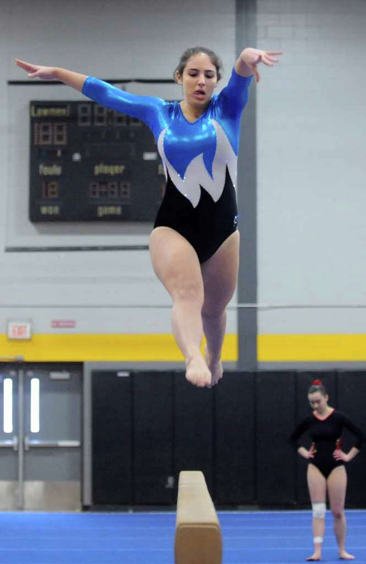 Wilton wins FCIAC gymnastics title; freshman McCaffrey stars for GHS