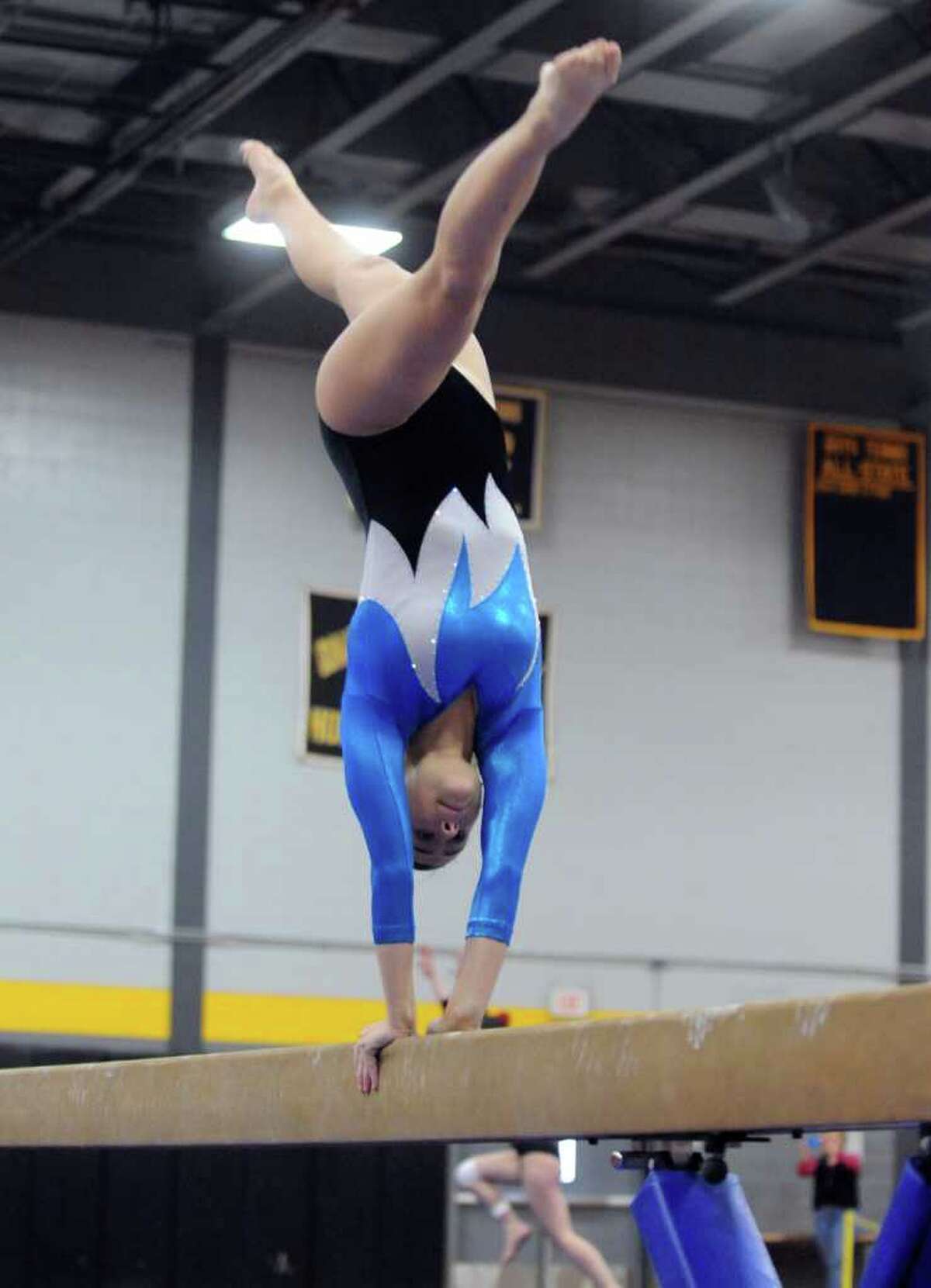 Wilton wins FCIAC gymnastics title; freshman McCaffrey stars for GHS