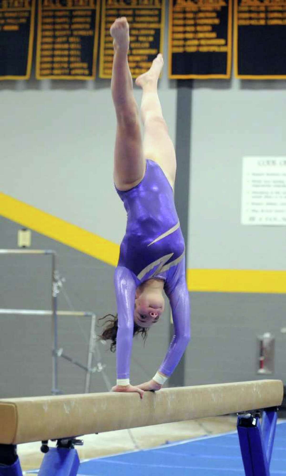 Wilton wins FCIAC gymnastics title; freshman McCaffrey stars for GHS