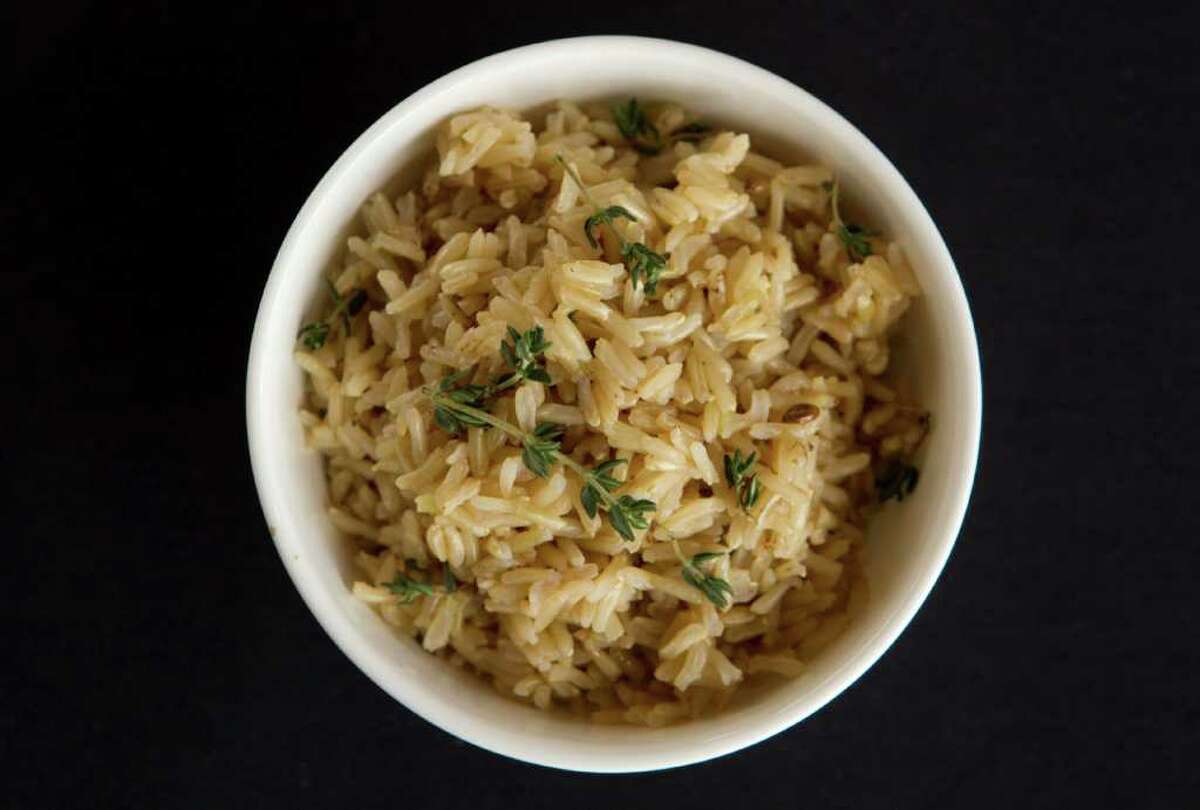 A bowl of Brown Basmati Rice with thyme is shown at Kirin's Restaurant and Bar Friday, Feb. 10, 2012, in Houston. ( Brett Coomer / Houston Chronicle )
