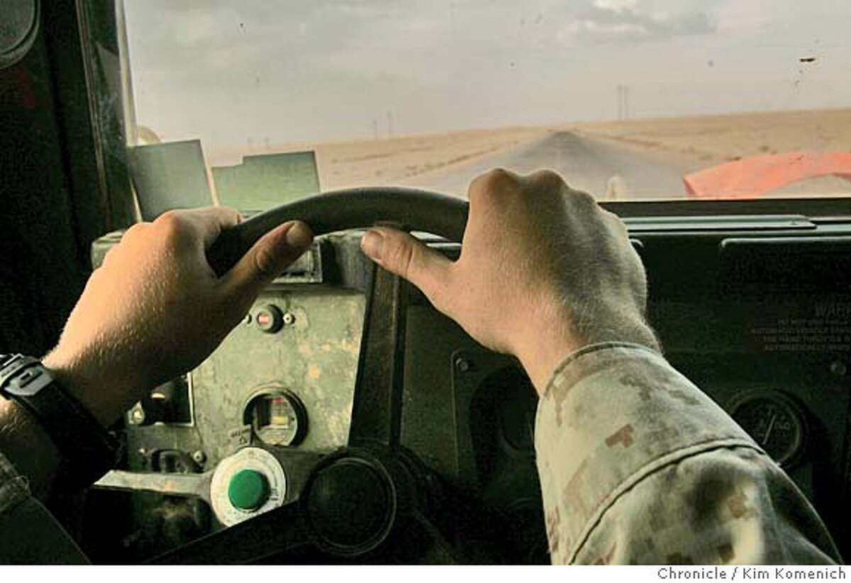 IRAQ30_BORDER_0028_KK.JPG Lance corporal Richard Tack of Rock Hill, Souith Carolina drives the humvee to the mission near the border. After sunset Thursday, Marines from the 1st Mobile Assault Platoon, Weapons Company, 3rd Battalion, 6th Marine Regiment set up mortars near the Syria-Iraq border. San Francisco Chronicle Photo by Kim Komenich 9/29/05