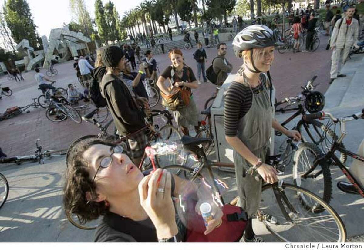 criticalmass26_18325_lkm.jpg Jane Block (below) passes the time before the beginning of Critical Mass by blowing some bubbles in Justin Herman Plaza on Friday, August 25, 2006. Friday night's ride marked the anniversary of Hurricane Katrina. *** Jane Block Laura Morton/The Chronicle