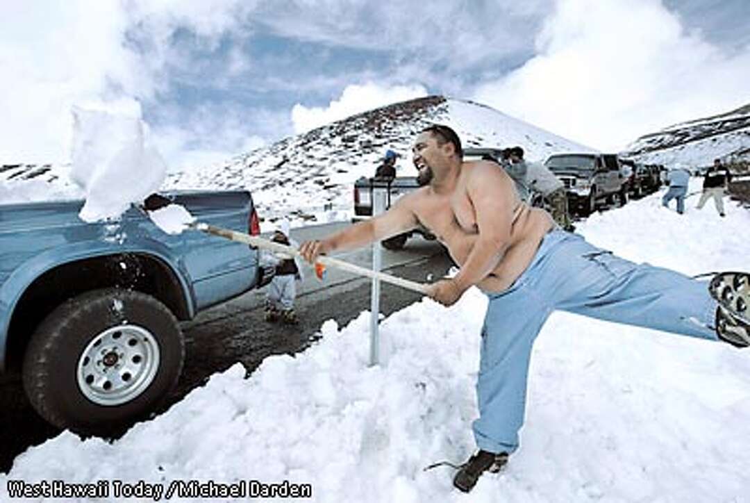 Snow blankets Mauna Kea and Mauna Loa on the Big Island of Hawaii