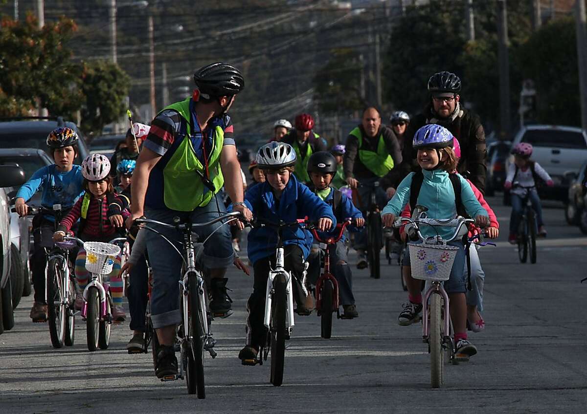 Students, parents, and faculty of Sunset Elementary School in San Francisco, Calif., participating in the second annual Bike to School Day as they ride up 41st Ave. in the Sunset on Thursday, April 15, 2010. Students at more than 30 San Francisco schoolsStudents, parents, and faculty of Sunset Elementary School in San Francisco, Calif., participating in the second annual Bike to School Day as they ride up 41st Ave. in the Sunset on Thursday, April 15, 2010. Students at more than 30 San Francisco schools participated led by the SF Department of Public Health.