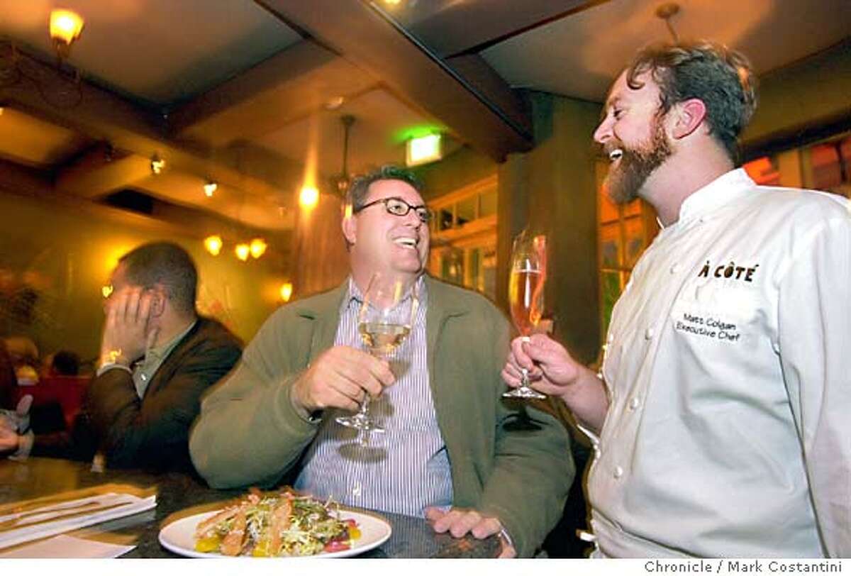chefsnightout25_0015.JPG Photo taken on 1/14/04 in Oakland. Chef Kimball Jones(left), dining at A Cote restaurant, has a drink with, jokes around with and talks shop with A Cote's executive cheff Matt Golgan(right). CHRONICLE PHOTO BY MARK COSTANTINI Kimball Jones, corporate chef for Wente Vineyards, raises a glass with A Cote executive chef Matt Golgan. ProductNameSundayDatebook