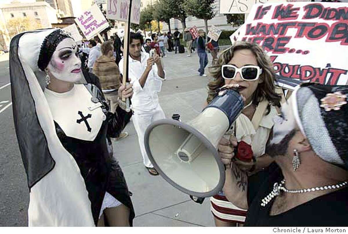sexprotest19_16043_lkm.jpg A performer who goes by the stage name Julia Foxx (second from left) joins a protest against the city's plans to ban private booths at clubs during a gathering outside city hall. Laura Morton/The Chronicle MANDATORY CREDIT FOR PHOTOGRAPHER AND SAN FRANCISCO CHRONICLE/ -MAGS OUT