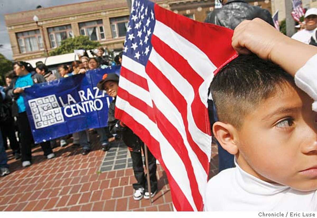immigration_protest_0022_el.JPG Giberto Vazquez,5, SF holds a flag with his cousin Faviola Zepeda,7, during the rally at 24th & Mission. This San Francisco press conference at 24th & Mission turned into a small rally. National Day of Action for Immigrant Rights. Big rallies in Phoenix, Washington DC and elsewhere. IN SF: 24th and Mission press event at 11 am.... Sheila Chung, dir. Bay Area Immigrant Rights Coalition: 510-839-7598; cell: 415-308-0776 sheila@immigrantrights.org Photographer: Eric Luse / The Chronicle