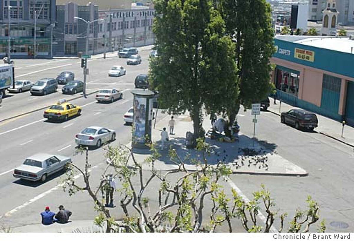 ISLAND. Homeless series. A traffic island at the corner of South Van Ness Avenue and 12th Street in San Francisco is home to about a dozen homeless people who use the proximity to the freeway to "sign" or panhandle. Here is an aerial view of the "island" taken from the Honda dealership nearby. BRANT WARD / The Chronicle