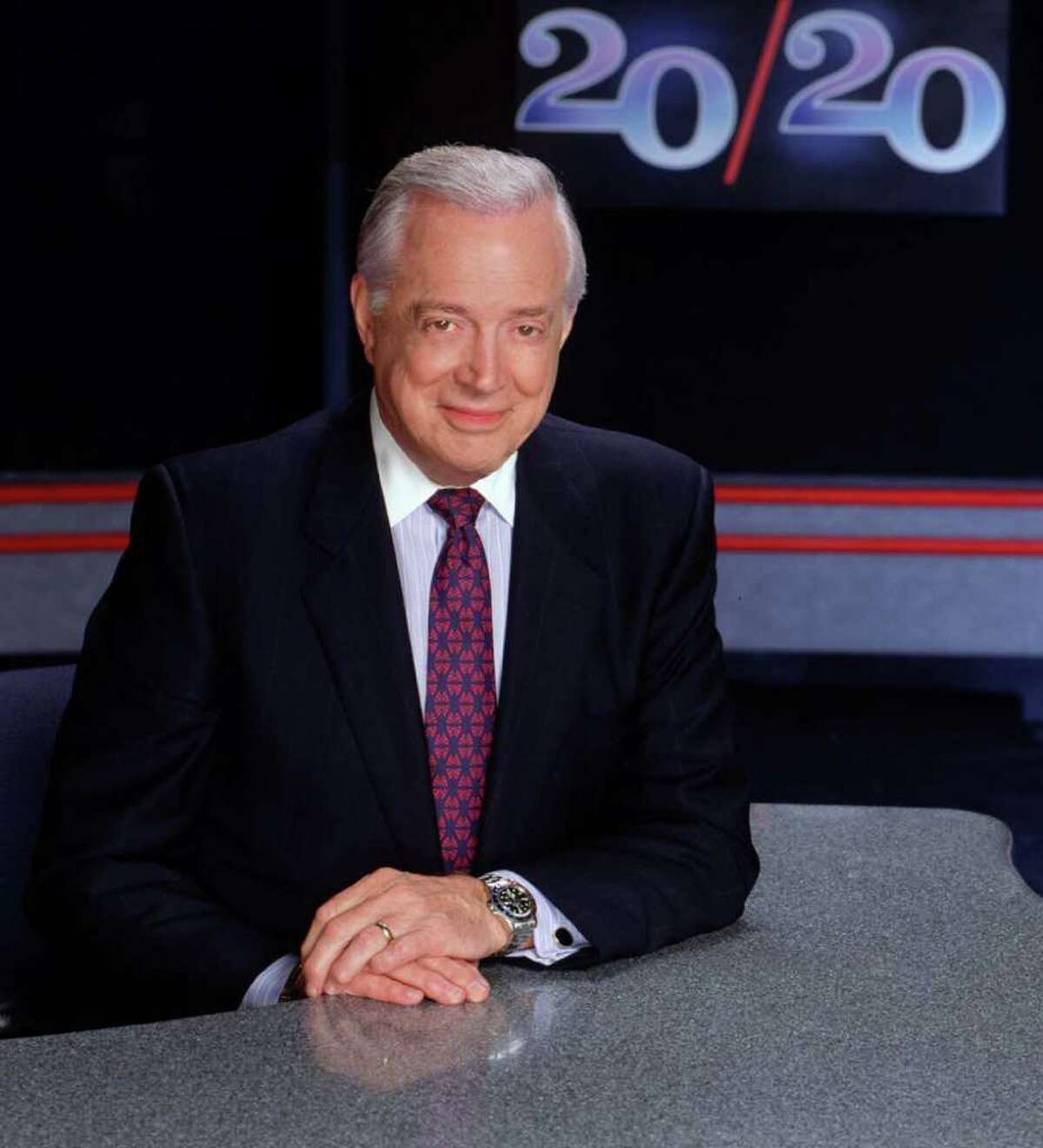 ADVANCE FOR FRIDAY, SEPT. 24--FILE--Hugh Downs is shown on the set of the ABC News magazine '20/20,' in this 1993 publicity photo. After tonight's '20/20,' Downs will end a 21 year stint as the program's anchor to begin an internet career with iNEXTV, a Web startup covering the government's executive branch. (AP Photo/ABC, Steve Fenn)