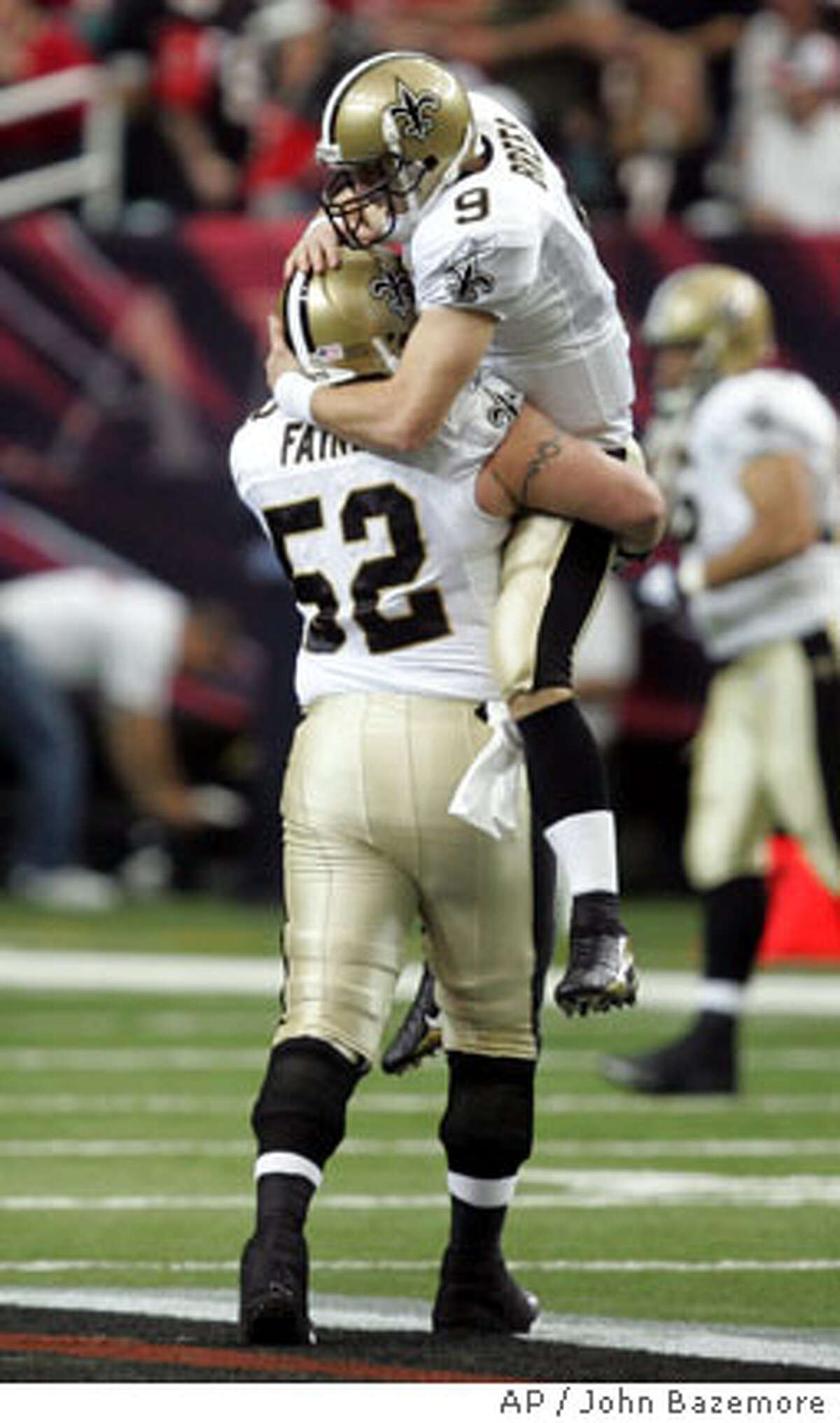 FOOTBALL IN NEW ORLEANS / A year after Katrina / More Saintly than ever