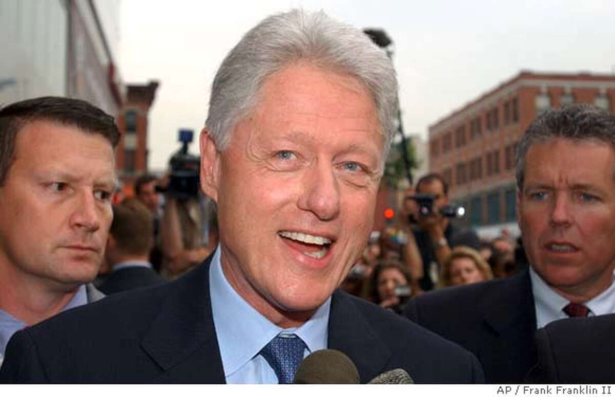 Former President Bill Clinton responds to questions during a news interview before signing copies of his book entitled "My Life" at the Hue-Man bookstore in New York, Tuesday, June 22, 2004. (AP Photo/Frank Franklin II)