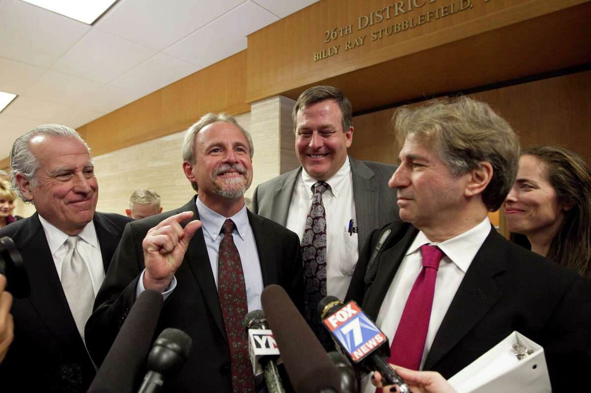 Evidence that could have prevented Michael Morton's (second from left), conviction wasn't given to his lawyer in his first trial.